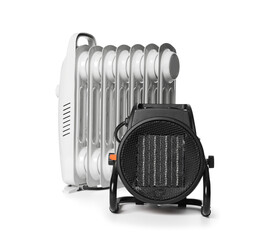 Different modern electric heaters isolated on white
