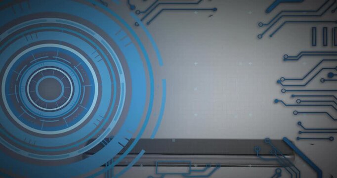 Upon laptop edge showing, blue ring fading, rotating, circuits animating, code typing for UI demo