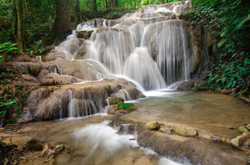 Pu Kaeng Waterfall, the most beautiful limestone waterfall in Chiang Rai Province, Thailand. A peaceful natural atmosphere in the countryside of Northern Thailand.