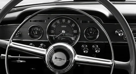 Fotobehang Oldtimers Vintage Car Dashboard Steering Wheel and Gauges Black and White  © Mithila Farzana