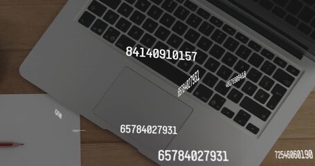 Numeric streams emerging from silver laptop floating above desk revealing paper pencil coffee cup - Powered by Adobe