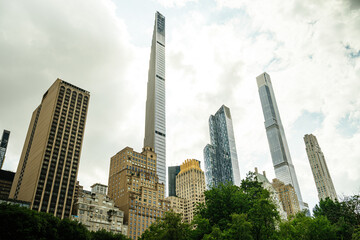 View from the edge of Central Park looking south toward Midtown Manhattan s ultra-slender Billionaires Row towers. The dramatic mix of older prewar towers and new needle-thin supertalls rises above