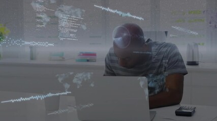 Software developer tapping keyboard and activating holographic map code overlays for data analysis - Powered by Adobe