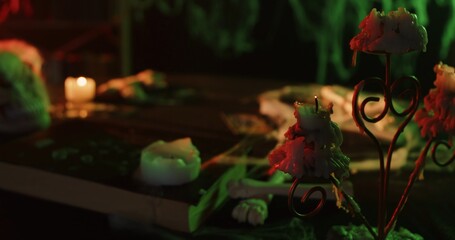 Spooky Halloween Candlelit Scene with Old Book