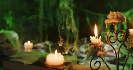Halloween Candlelit Scene with Eerie Green Smoke