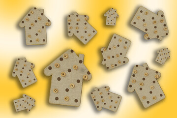 decorative wooden houses on a gentle yellow gradient background. wooden Toys. housing and construction concept