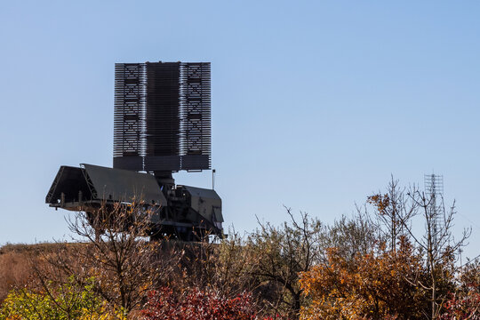 Military radar system for air defense, detecting drones and UAVs. Part of modern PVO network protecting airspace against aerial threats in open terrain.