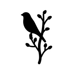 Silhouette of a bird resting peacefully on a budding tree branch