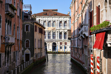 Historic Venetian houses and water canal in Italy