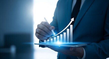 Businessman analyzing financial growth chart on digital tablet