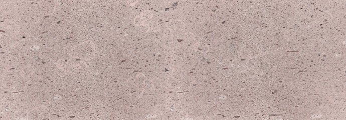 Spekled pink rock surface texture background