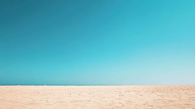 empty sandy beach, clear blue sky with lots of negative space, 