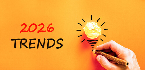 2026 Trends new year symbol. Concept words 2026 Trends on beautiful orange paper. Beautiful orange...
