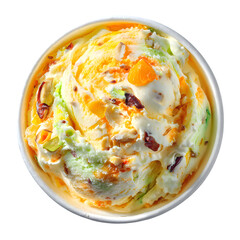 Top view of pistachio and mango ice cream with nuts in a cup. Gourmet Indian Kulfi style frozen dessert isolated on black background.