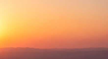 Obraz premium Beautiful sunset sky with orange and yellow gradient colors, nature background