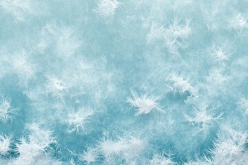 Intricate ice crystals blanket a cool surface in wintertime beauty