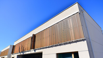 Newly built terraced houses in a residential area. Modern terraced houses on the outskirts of the city.
