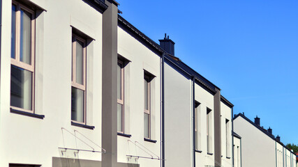 Newly built terraced houses in a residential area. Modern terraced houses on the outskirts of the city.