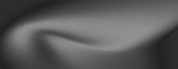 Abstract grayscale image of draped fabric with soft folds and shadows.