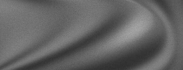 Abstract gray fabric texture with soft folds and subtle light reflections.