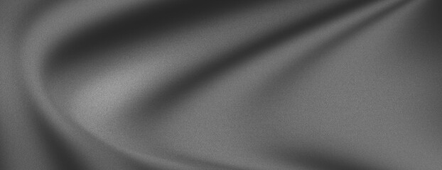 Abstract gray fabric texture with soft folds and drapes.