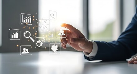 A hand interacting with floating business and technology icons in a modern office setting space