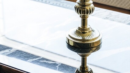 Obraz premium Elegant brass lamp reflected on a marble table surface