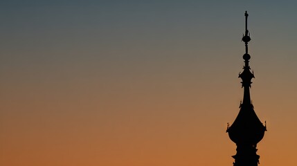 SilhouettedSpireAtSunset