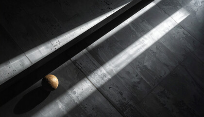Concrete surface with diagonal natural lighting, moody overhead composition
