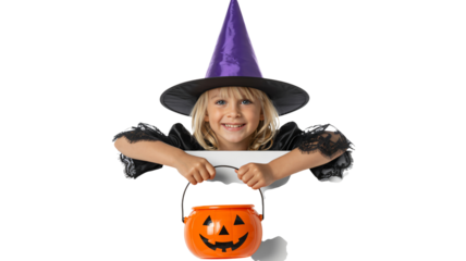 Adorable little girl dressed as a witch with a pumpkin candy bucket ready for Halloween fun, perfect for spooky season promotions and festive designs
