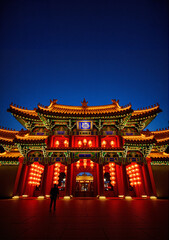 Traditional Chinese building illuminated at night for Lunar New Year  