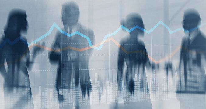 Businesspeople analyzing data and growth charts on digital screen for financial success