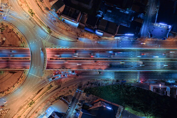 Expressway, Self-driving autonomous electric cars of the future with elements move along a busy traffic intersection. Artificial Intelligence, Car Scan, GPS Tracking, Smart Roads, IoT, highway