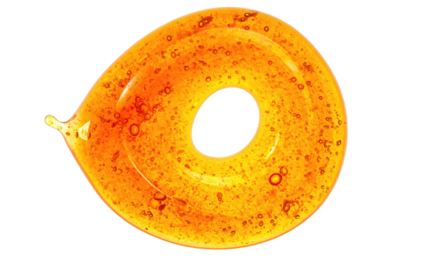 A swirling, translucent, amber-colored liquid forms a spiral shape with a dark, central hole