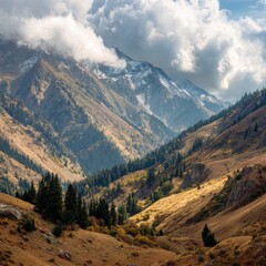Mountain landscape of snow-capped mountains in the mist.
