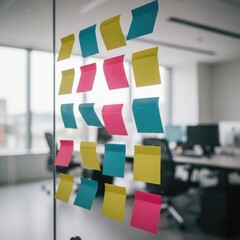 Colorful sticky notes on glass wall in modern office, creative brainstorming and agile workflow concept