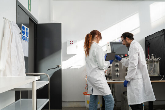 scientists working in biotech laboratory