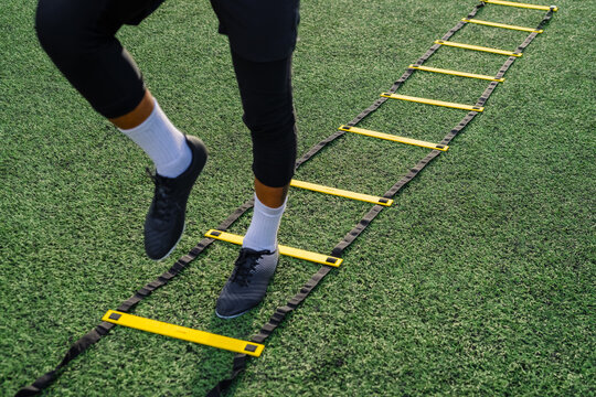 Anonymous athlete performing speed drill 