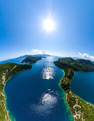 Aerial view of sunny coastal landscape