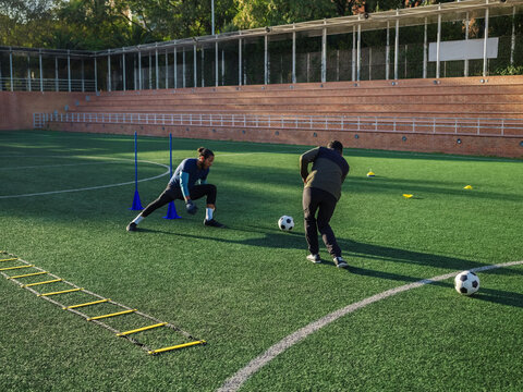 Goalkeeper training low ball catching skills