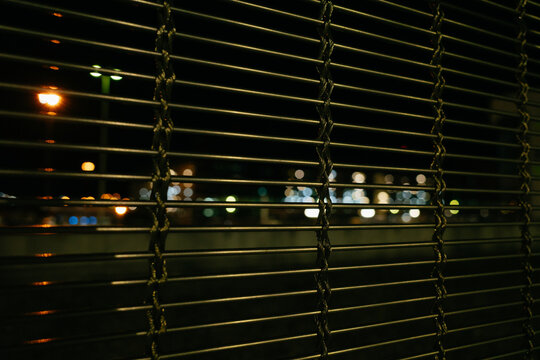 Metal Grate with Urban Lights