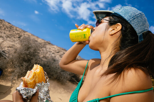 Woman Enjoying Refreshments on Vacation