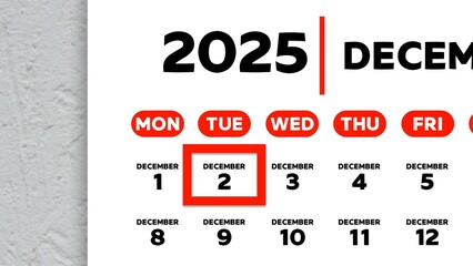 Close-up of the date December 2nd marked with a red cursor on the wall calendar 2025