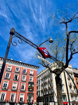 Madrid Metro Tirso de Molina sign with spring sky