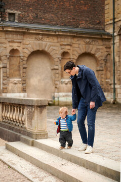 father and son in paris park
