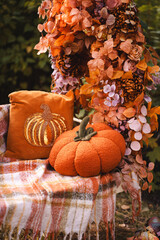 Fall Pumpkin Setup with Floral Garland and Blanket
