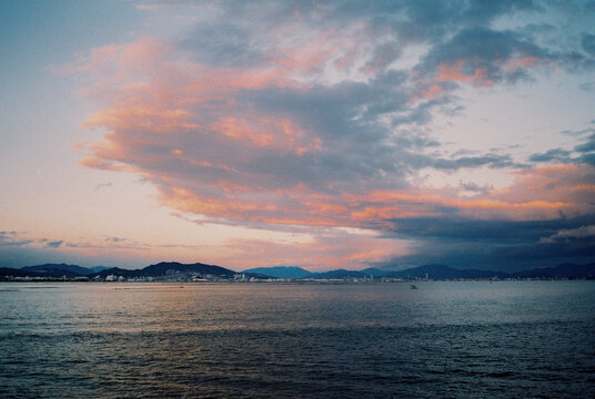 Distant view of islands on the Philippines visible across the sea