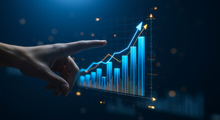 Hand pointing at glowing blue bar graph with upward trend lines