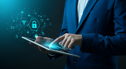 Person in blue suit using tablet with glowing digital security icons