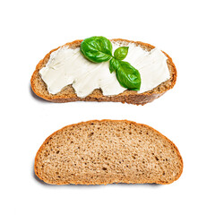Bread with butter and slice of bread on white